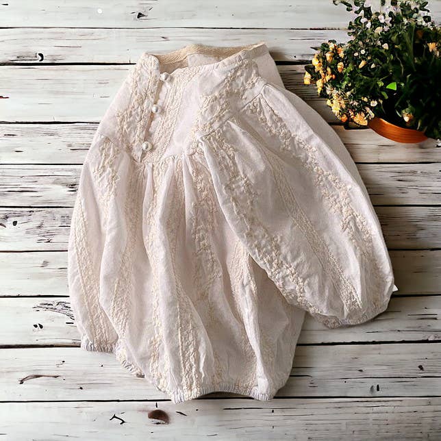 Organic cotton bodysuit with embroidery